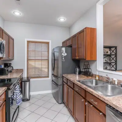 Kitchen of short-term rental, featuring the stainless steel appliances